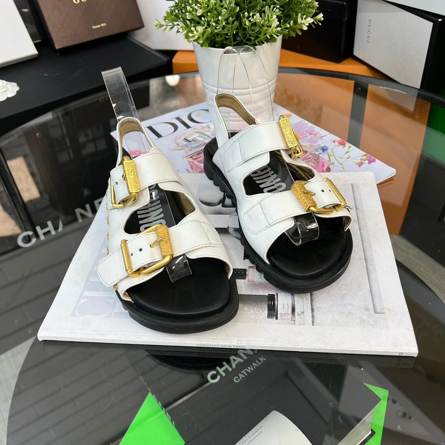 Moschino White And Gold Sandals
(U.K. 4)