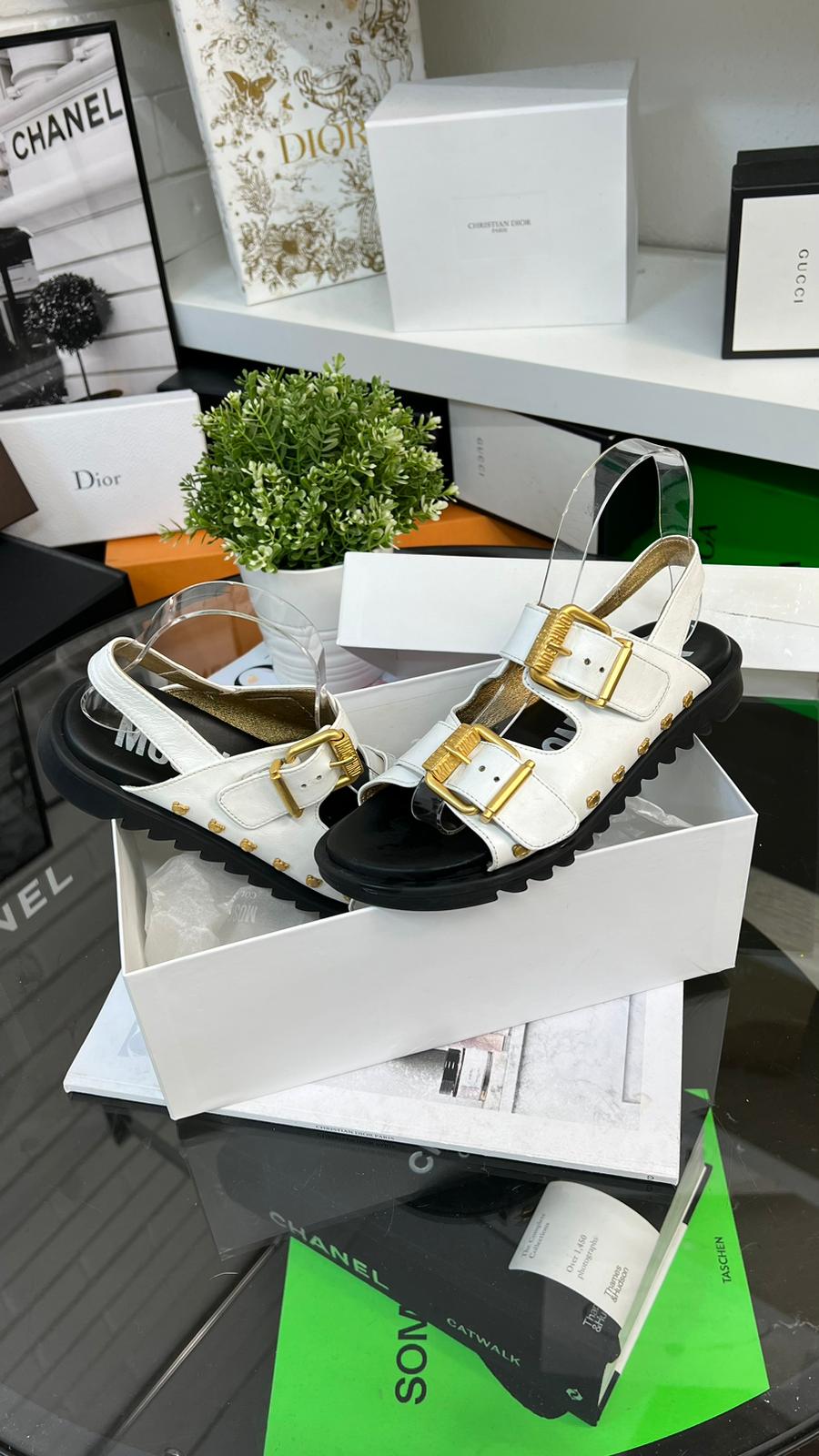 Moschino White And Gold Sandals
(U.K. 4)