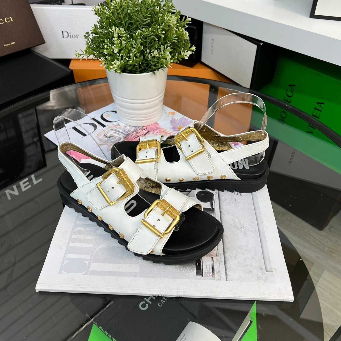 Moschino White And Gold Sandals
(U.K. 4)