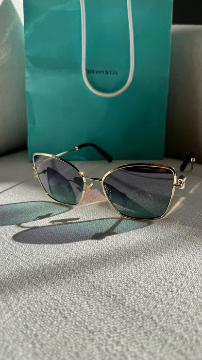 Tiffany & Co Pale Gold Metal With Grey Gradient Butterfly Lenses T Logo Sunglasses – 58mm Lens