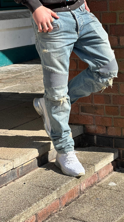 Balmain Men's Distressed Biker Tapered Jeans In A Light Blue Wash - 32 waist