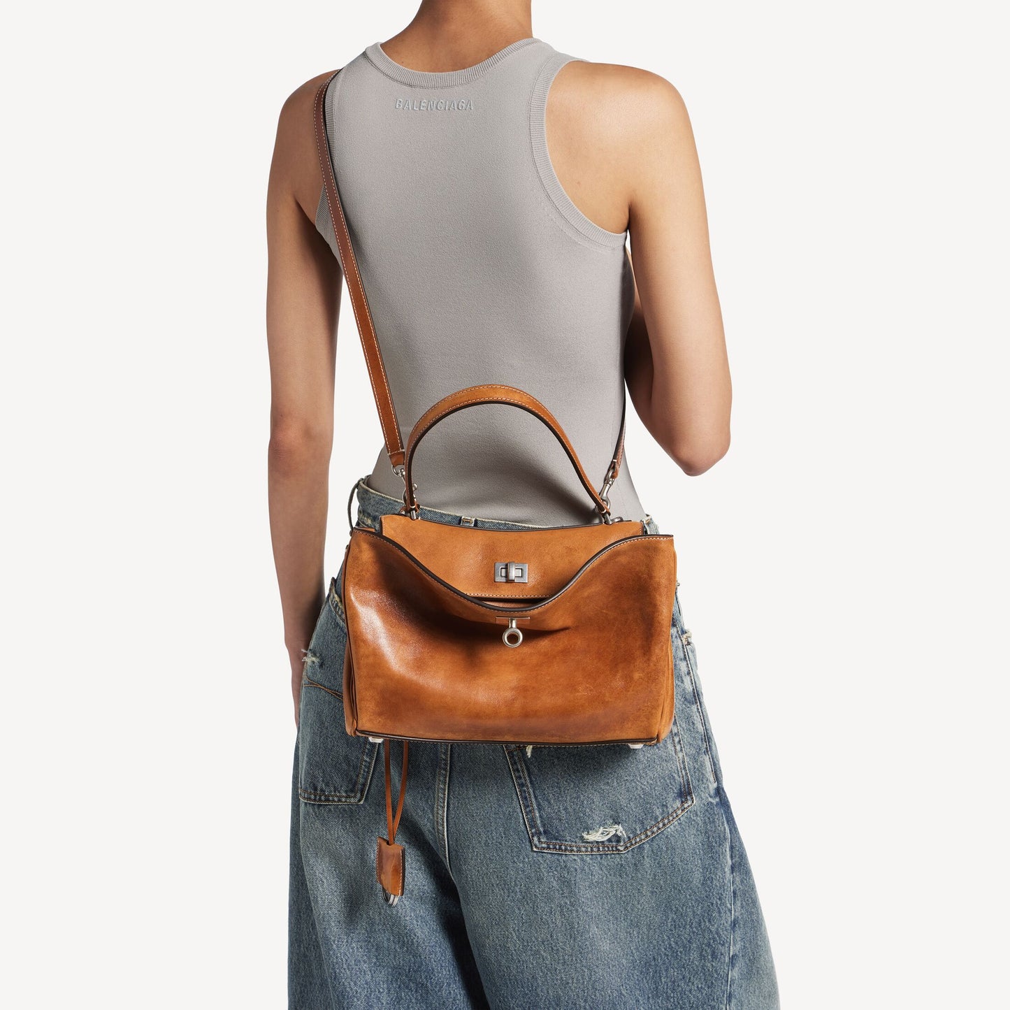 Balenciaga Rodeo Handbag Small in tan cowboy Vegetal tanned lambskin handbag , as new.