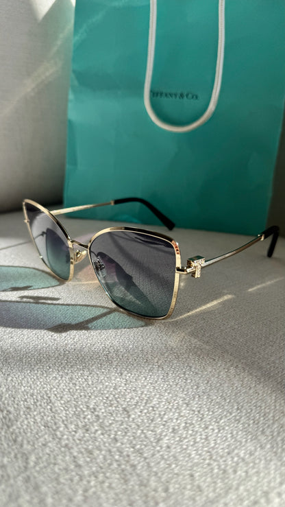Tiffany & Co Pale Gold Metal With Grey Gradient Butterfly Lenses T Logo Sunglasses – 58mm Lens